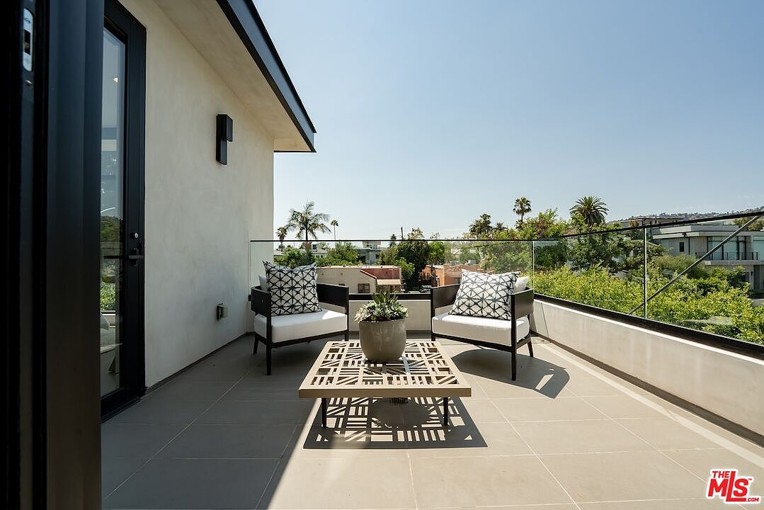 Rooftop deck with city views from Downtown LA to the Hollywood Hills.